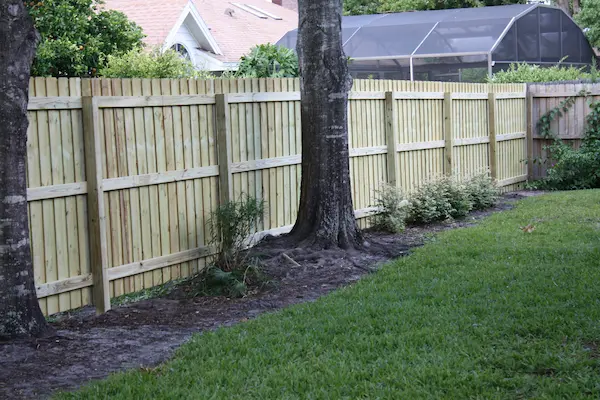 wood fence installation on Ballard Ave Wedgefield FL